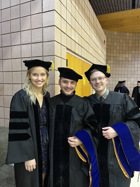 Savannah, Michael, and Philip before graduation
